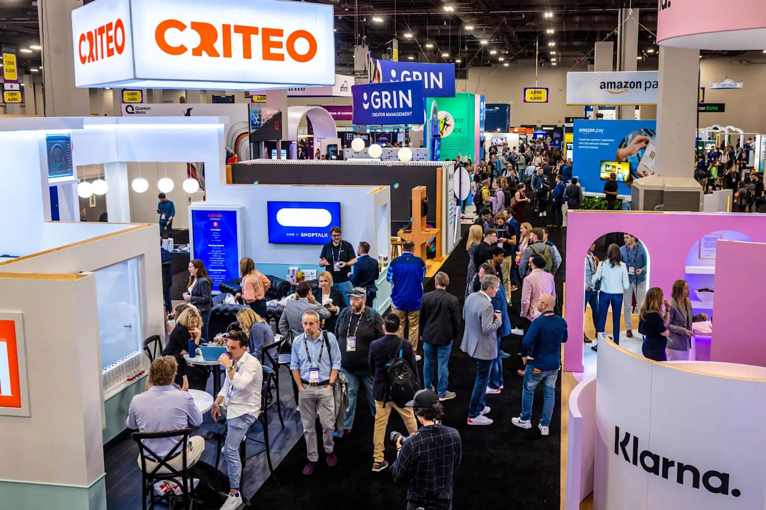 Shoptalk 2026 expo floor with retail technology booths and attendees